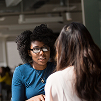 Two women talking