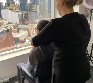 Team member having a shoulder massage in office